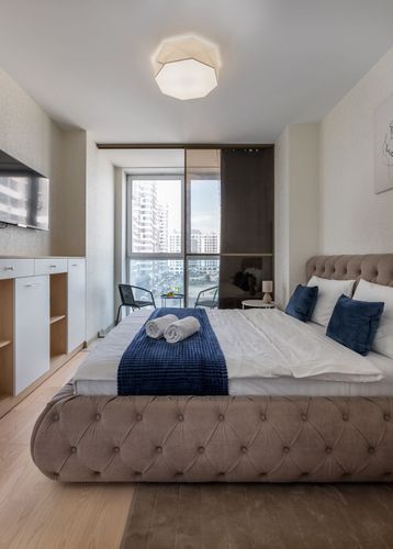 Фото 5: Квартира посуточно — Апартаменты 52 м² в ЖК «Маяк Минска» с видом на Национальную библиотеку